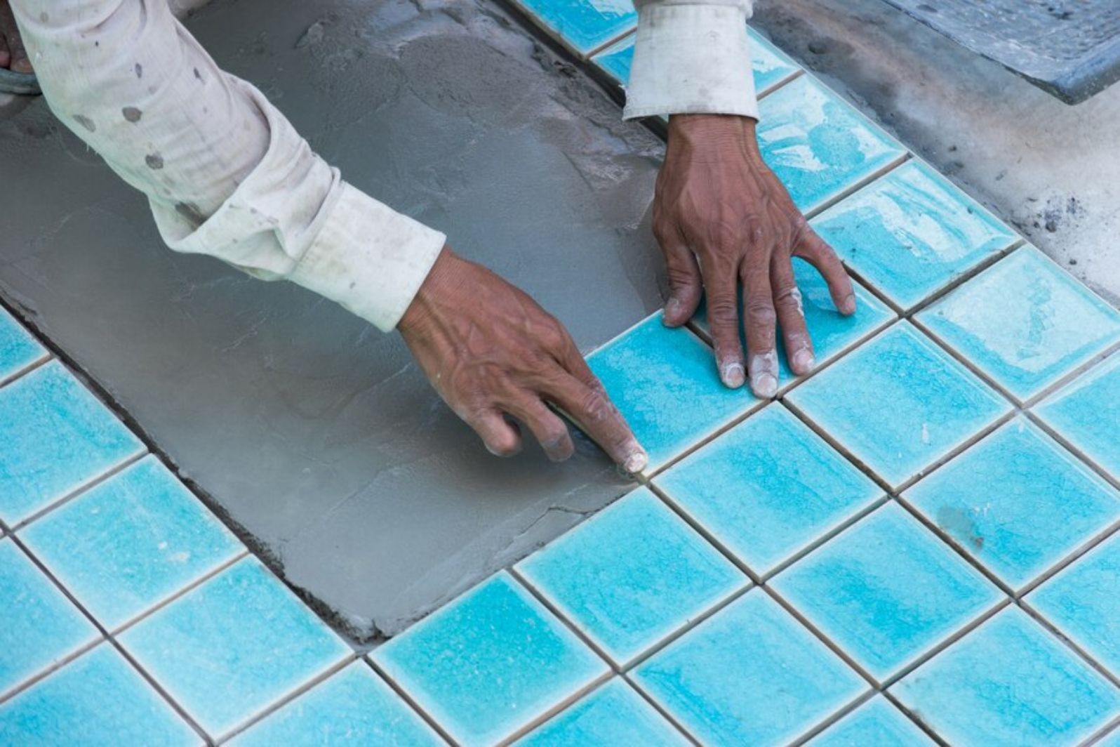 Beyond Surface Beauty: Transform Your Pool with Professional Tile Installation Services
